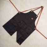 Tablier fendu en cuir et toile waxée n°690 Bretelles croisées - Noir