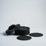 Boite de 12 sous-verres en perles - Noir